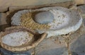 Neolithic era hand mill stone with barley and flour bowl made Royalty Free Stock Photo