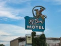 Neon advertising sign for El Don Motel in Albuquerque, New Mexico. Cowboy and horse in mid-century modern style.