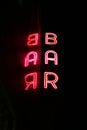 Neon bar sign with reflection Royalty Free Stock Photo