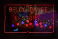 Neon Belly Dance Lessons Neon SIgn in Rainy Window