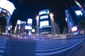 Neon billboard and LED displays at Shibuya crossing at night