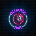 Neon billiards bar sign on a brick wall background. Glowing billiard ball with 8 number. Night advertising symbol