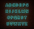 Neon blue alphabet type font vector isolated on brick wall. ABC typography letters light symbol, decoration text effect. Neon Royalty Free Stock Photo