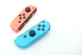 A neon blue and neon red Nintendo Switch joycon