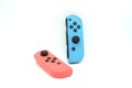 A neon blue and neon red Nintendo Switch joycon