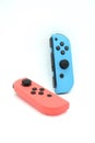 A neon blue and neon red Nintendo Switch joycon