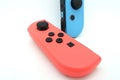 A neon blue and neon red Nintendo Switch joycon Royalty Free Stock Photo