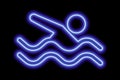 Neon blue silhouette of freestyle swimmer with waves on black background