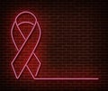 Neon breast cancer awareness signs isolated on brick wall. Pink ribbon light symbol, led effect. Neon illustration