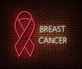 Neon breast cancer awareness signs isolated on brick wall. Pink ribbon light symbol, led effect. Neon illustration