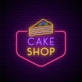 Neon cake sign.