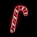 Neon candy cane icon isolated on black background. X-mas, sweets, treats concept