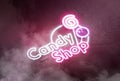 Neon candy shop sign dark concrete wall, glow font mockup