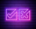 Neon check mark and cross on brick wall. Pink tick and decline symbol isolated on brick wall. Accept and reject. Right and wrong.