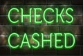 Neon CHECKS CASHED sign Royalty Free Stock Photo