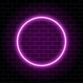 Neon circle lamp isolated on brick wall. Pink glowing circle bulb. Sparkling circle banner with place for text. Modern