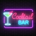 Neon cocktail bar and cafe glowing sign with geometrical frame on a brick wall background. Royalty Free Stock Photo