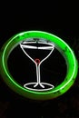 Neon Cocktail Glass framed by a Circle