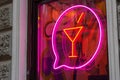 Neon cocktail sign on the bar nightclub window. illuminated design