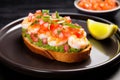 neon colored plate with freshly made shrimp bruschetta