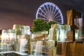 Seattle Great Wheel and Modern Fountain Sculpture at Night Royalty Free Stock Photo