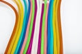 Neon flexible strip light. Flexible led tape neon flex in different colors on white background Royalty Free Stock Photo