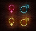 Neon gender symbols signs vector isolated on brick wall. Male and female sign light symbol, decorati Royalty Free Stock Photo