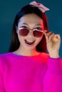 neon girl eyewear fashion asian model sunglasses Royalty Free Stock Photo