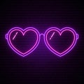 Neon glasses in the form of hearts.