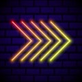 Neon glowing arrow pointer on dark brick wall background. Colorful and shining retro light sign. Vector design element Royalty Free Stock Photo