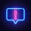 Neon glowing exclamation mark. Quiz neon banner. Shining neon speech bubble. Color neon frame on brick wall. Realistic