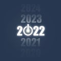 2020, 2021, 2022, 2023, 2024 neon glowing numbers on dark background. Power button. New Year`s banner. The concept of the start o Royalty Free Stock Photo