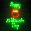 Neon glowing saint patricks day sign with pot of treasure on a brick wall background. National Irish holiday symbol.