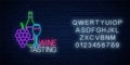 Neon glowing sign of wine tasting in circle frame with alphabet. Bunch of grapes with bottle and glass of wine