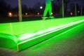 neon green cruiser board on a skate park ramp