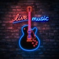 Neon guitar on the wall and the sign that says live music on it