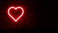 Neon heart on brick wall Royalty Free Stock Photo