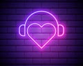 Neon Heart with headphones. Vector illustration of DJ heart icon with headphones in glowing neon style. Graphic element for