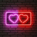 Neon hearts on brick wall Royalty Free Stock Photo