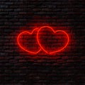 Neon Hearts on the birck wall