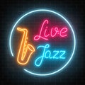 Neon jazz cafe with live music and saxophone glowing sign on a dark brick wall background. Royalty Free Stock Photo