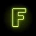 Neon letter F on black