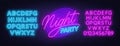 Neon lettering Night party on brick wall background. Glowing fonts.