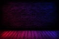 Neon light on brick walls that are not plastered background and wooden floor. Hardwood floor texture of empty brick basement wall Royalty Free Stock Photo