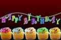 Neon light happy birthday concept with colored cup cake Royalty Free Stock Photo