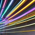 744 Neon Light Stripes: A futuristic and dynamic background featuring neon light stripes in electrifying and vibrant colors that Royalty Free Stock Photo