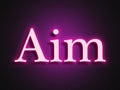 Pink glowing Neon light text effect of word Aim. Royalty Free Stock Photo