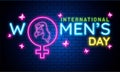 Neon lighting effect text International Women`s Day.