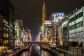 Neon lights lit up streets along the Dotonbori Canal at night, Osaka, Japan