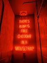 Neon Lights theres always free cheddar in a mousetrap Royalty Free Stock Photo